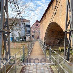 Pedestrian suspension bridge across the Pegnitz